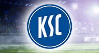 Das Logo vom Karlsruher SC und im Hintergrund ein Stadion.
