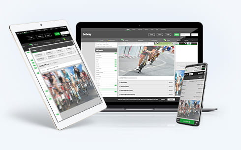 Ein Laptop, ein Tablet und ein Smartphone mit Wetten zur Tour de France.