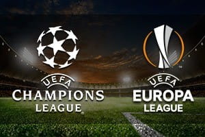 Die beiden Logos von Champions League und Europa League und im Hintergrund ein Stadion.