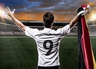 Ein Fußballer im Deutschland-Trikot mit der Rückennummer 9 in einem Stadion