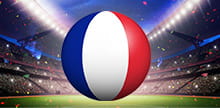 Die Flagge von Frankreich und im Hintergrund ein Stadion.