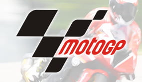 Das MotoGP Logo und im Hintergrund ein Motorradfahrer.