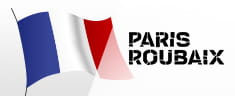 Das Logo von Paris-Roubaix und eine französische Fahne.