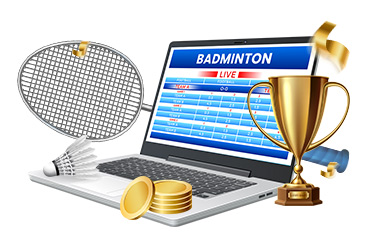 Ein Laptop mit Badminton Live Wetten, ein Pokal, Münzen sowie ein Schläger und ein Federball
